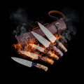 5-Piece Damascus Kitchen Knife Set with fire and ember backdrop